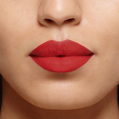 Tono Le Rouge Determination en labios